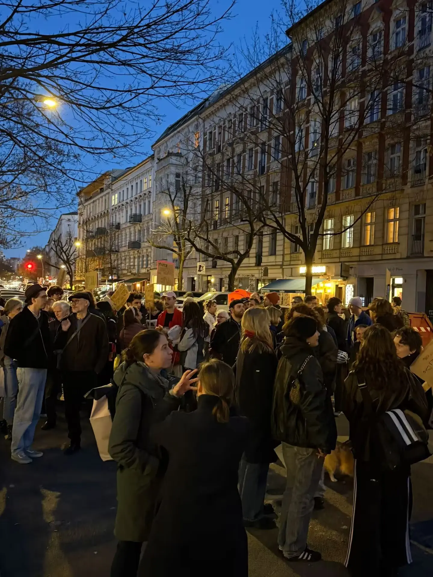 Neighbours, tenants and supporters gathering in front of the building before the demo.