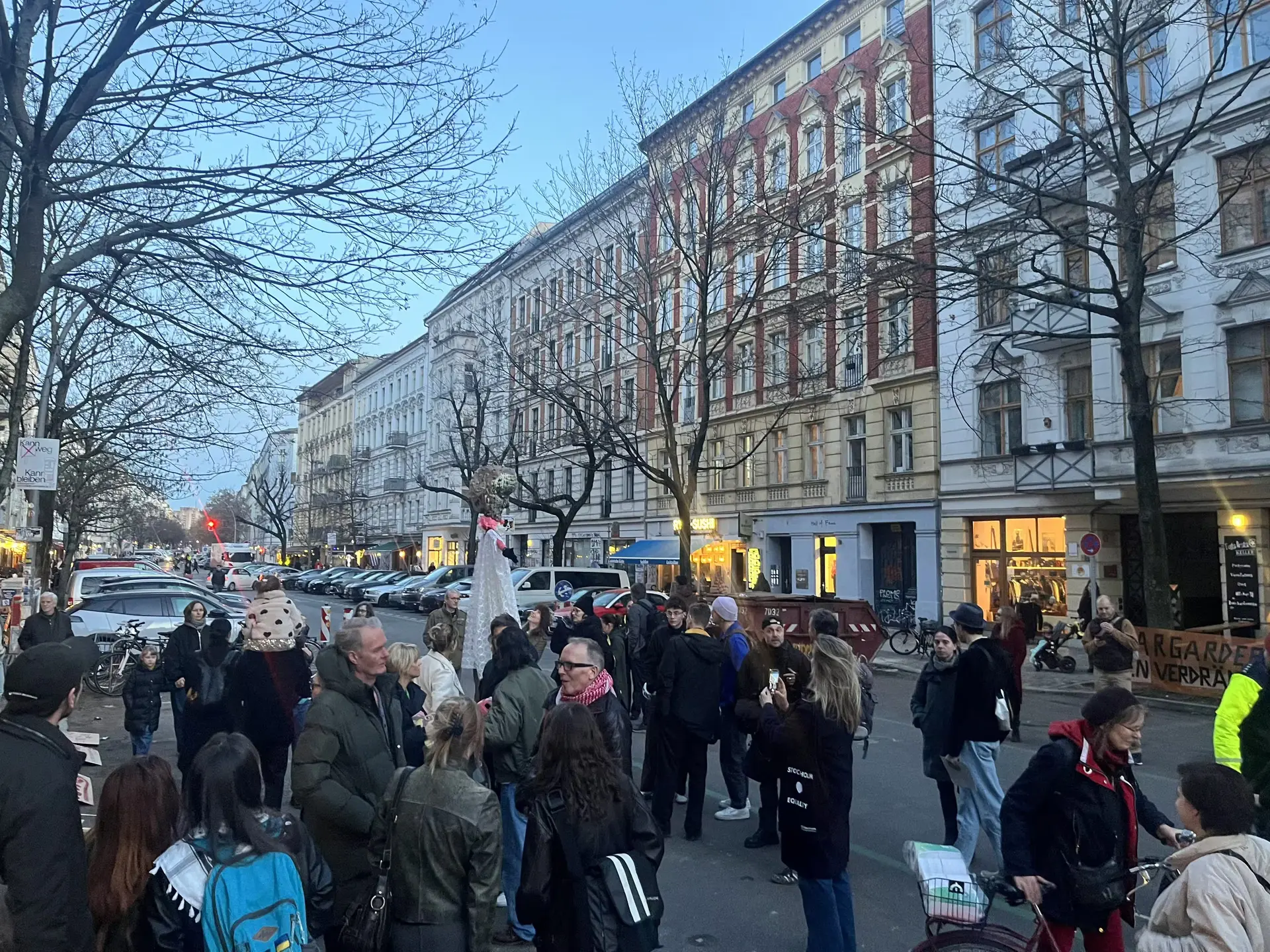 People showing their solidarity with the affected tenants and neighbours and discussing the issues.